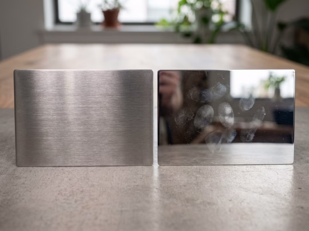 Brushed and mirror stainless steel finishes side by side Brushed and mirror stainless steel finishes side by side