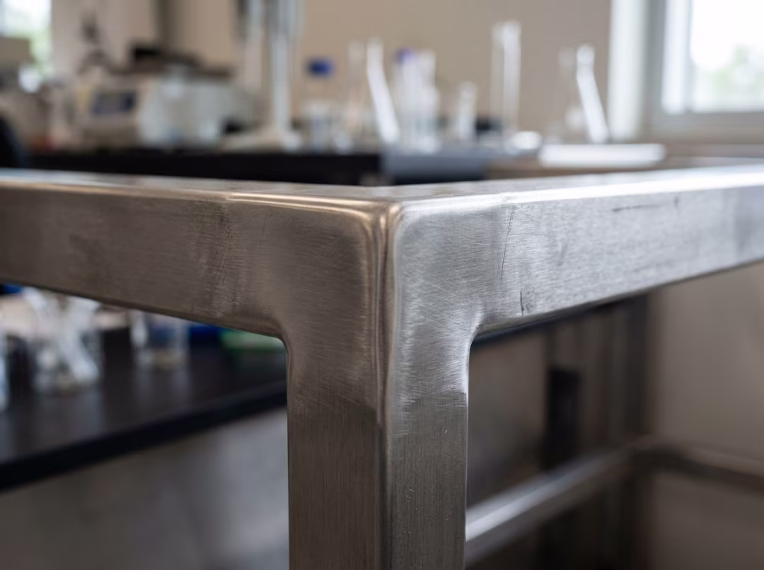 Close up of a welded stainless steel table joint Close up of a welded stainless steel table joint
