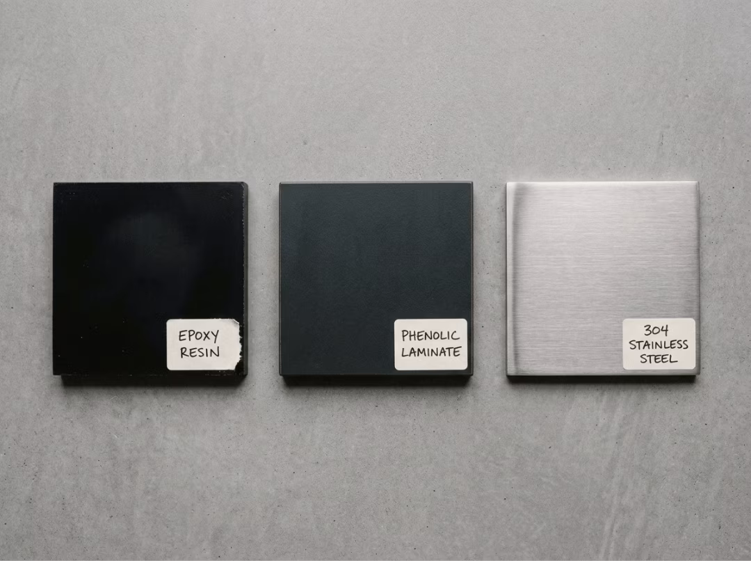 Phenolic, epoxy, and stainless steel sample panels Phenolic, epoxy, and stainless steel sample panels